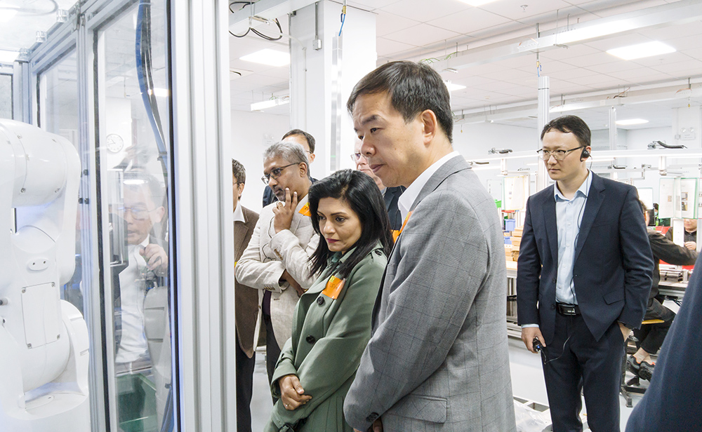 Global Executives touring the factory production line